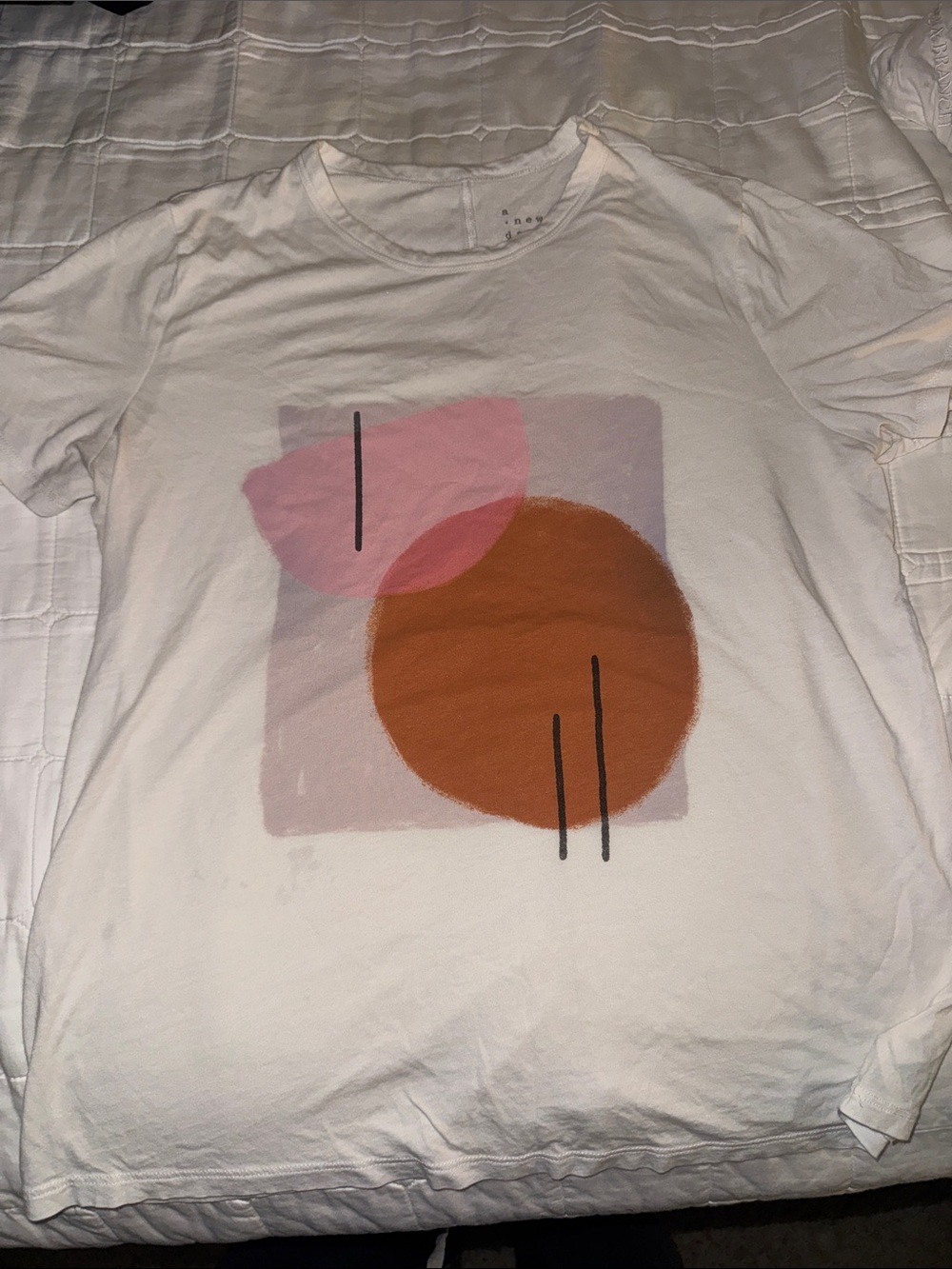 White Graphic Tee with Pink and Brown Geometric Print